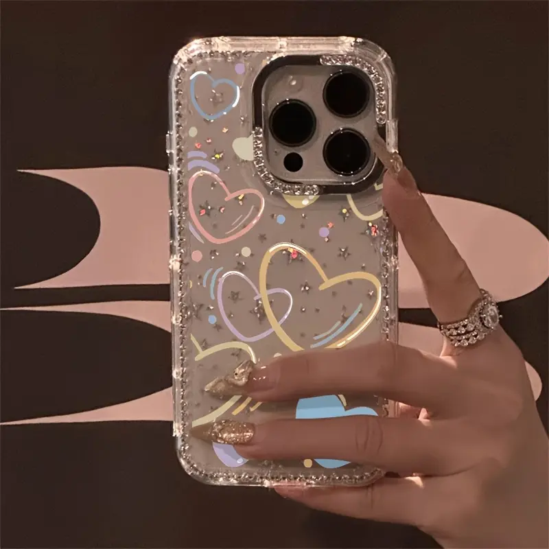 Graffiti Heart-Patterned Luxury Rhinestone Fashion Phone Case, Transparent Rhinestone-Edged Star-Printed Shock-Resistant Case, Compatible with iPhone 17 Pro Max, 17 Air, 16, 15, 14 Plus, 13, and 12