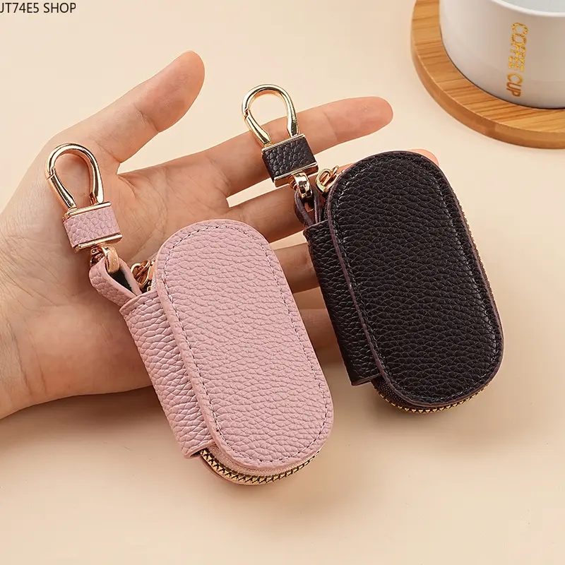 Solid color simple lychee pattern women's lychee pattern key bag car general purpose large capacity light household key bag men