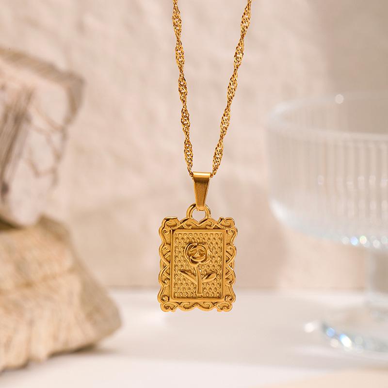 European and American embossed necklaces, niche luxury heart-shaped Cupid pendants, stainless steel sweater chains, vintage titanium steel accessories