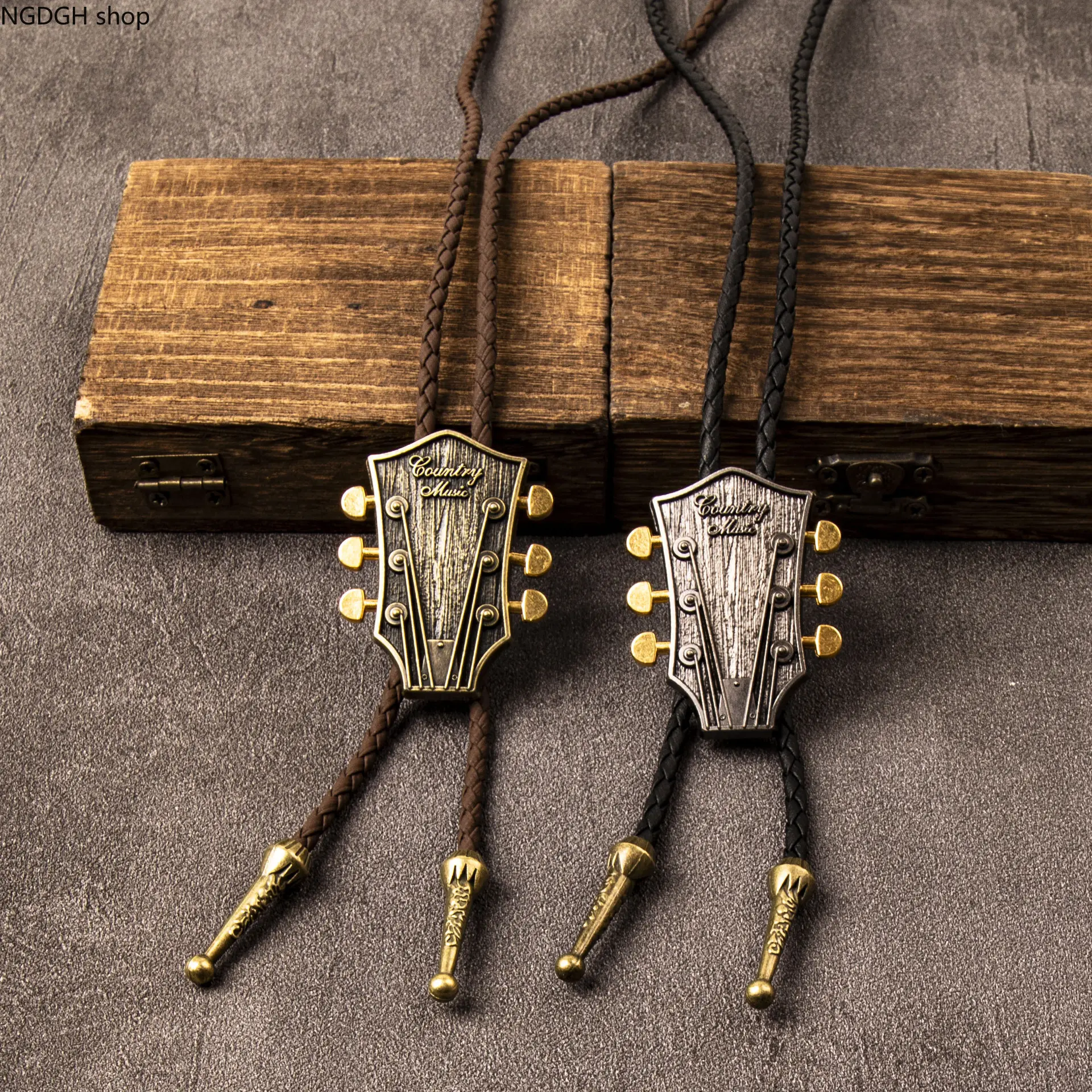Vintage Guitar Head Bolo Tie with Brown Braided Leather Cord, Retro Brass Metal Slide Necktie, Music Lover Western Accessory, Unique Gift for Guitarists, Perfect for Concerts, Rodeo Parties & Acoustic Outfits.