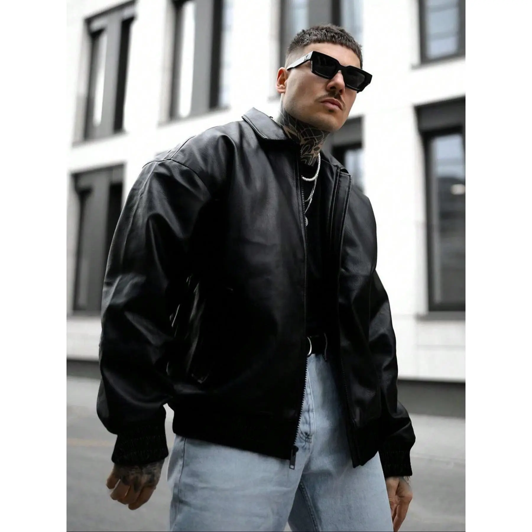 This stylish jacket enhances your men's fashion taste. The classic collar and full zipper closure create a bold street style, and the loose silhouette is suitable for daily urban wear and casual street style occasions.
