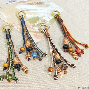 Hand Woven Macrame Keychain Pendant Mixed With Natural Wooden Beads Retro Ethnic Bohemian Texture Light Compact Flexible Cord Strap For Car Key Handbag Daily Matching Minimalist Unique Personality Decorative Accessory