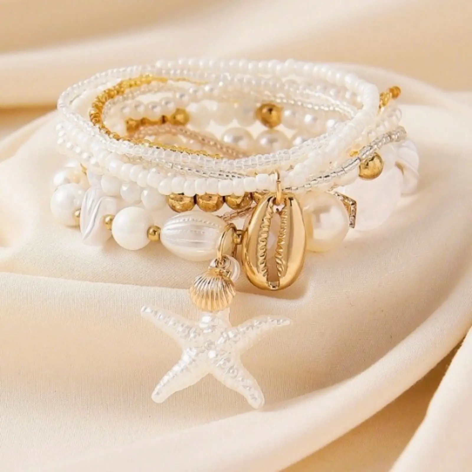 Women's 7Pcs Pearl Starfish Shell Cowrie Gold Beaded Layered Strand Bracelets Set - Stackable PU Leather Wristband, Boho Beach Vacation Camping Companion Jewelry Gift for Sports & Outdoor Hammock Use