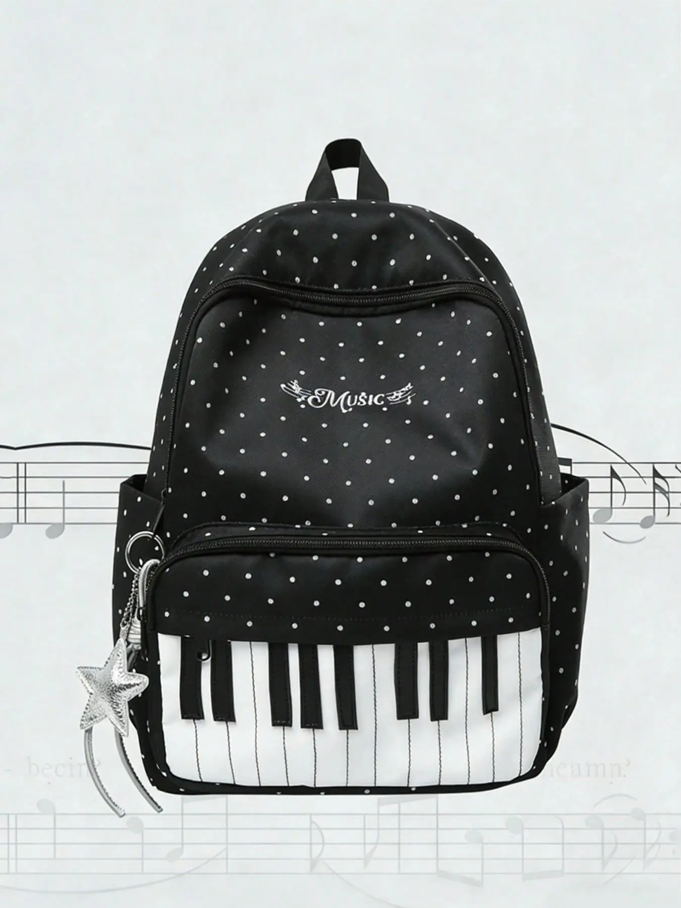 Back-to-school season creative black and white piano keyboard backpack, niche design with fresh polka dot print, adjustable shoulder straps, lightweight and versatile for daily commuting, traveling, or school outings.