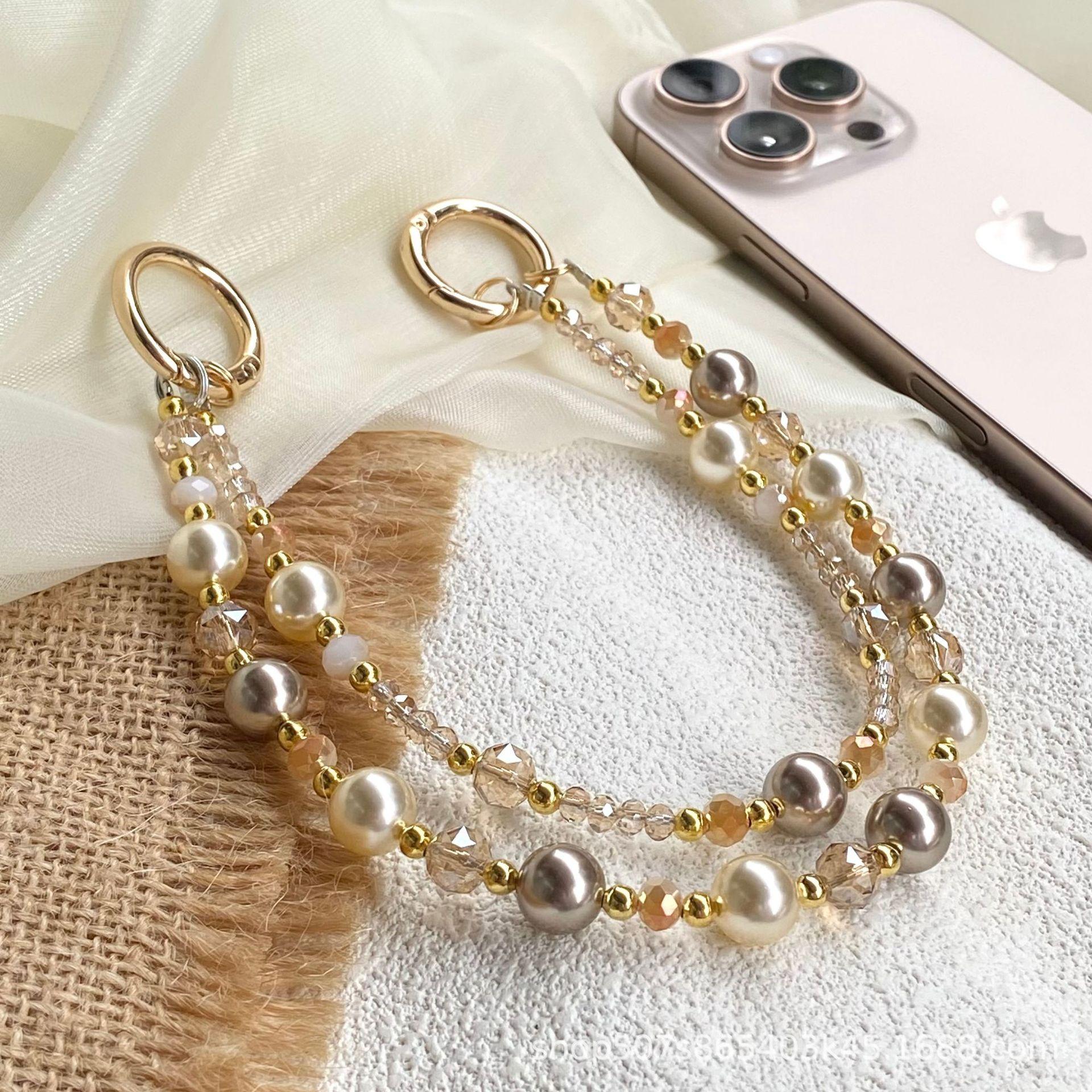 Amber gold foil bead crystal double-chain phone strap, high-end anti-loss pendant chain, luxurious style keychain phone strap