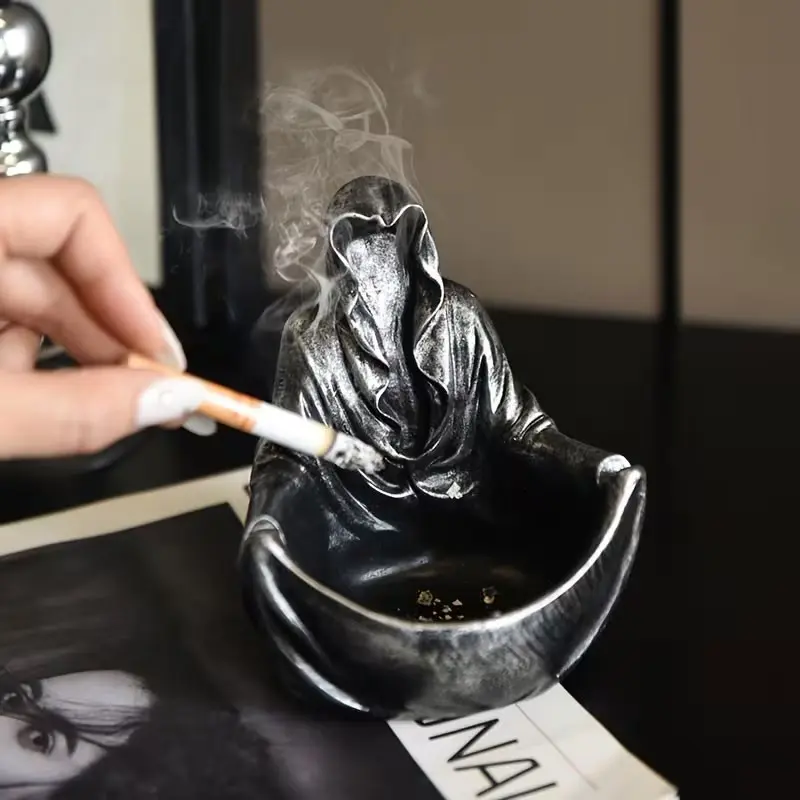 A black humor-themed ashtray inspired by mysterious figures, perfect as a gift for Father's Day.