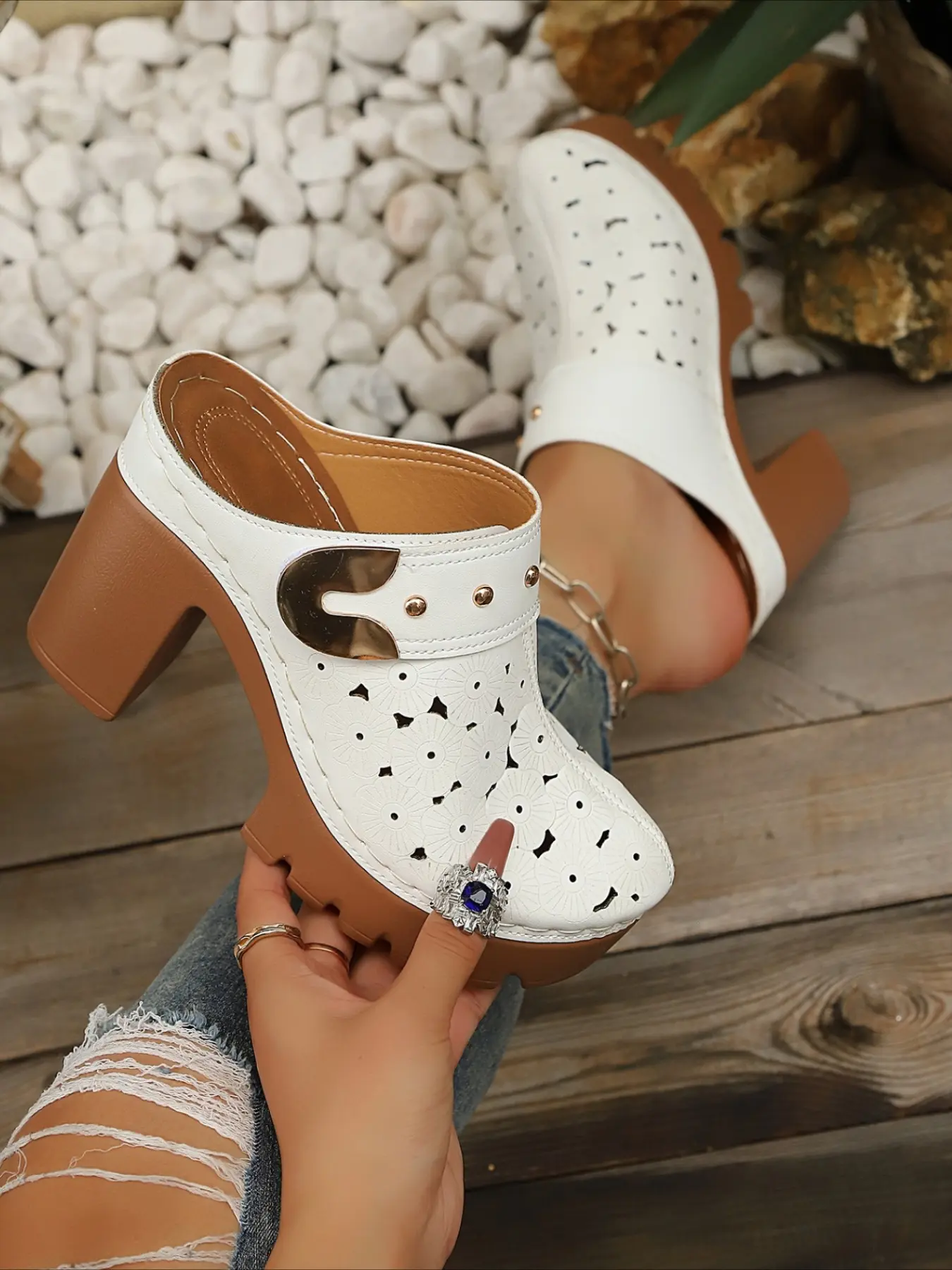 Vintage-inspired block heel sandals. Thong-style design elongates legs. Chunky platform for comfort. Perfect with jeans or dresses for summer vibes, elevated sandals.