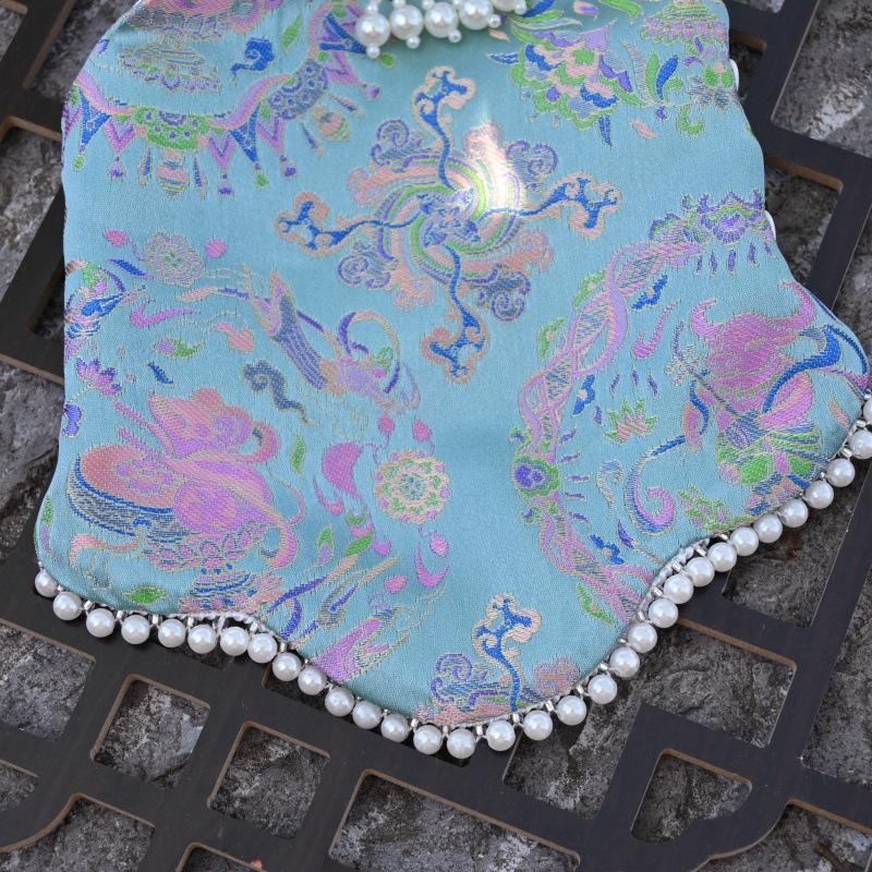 Paws Trendy Pet Spring & Summer Qipao for Dogs & Cats, suitable for Teddy, Bichon Frise and other small dogs. Features embossed fabric with exquisite retro frog buttons, fine workmanship, exuding noble elegance and making your beloved pet stand out.