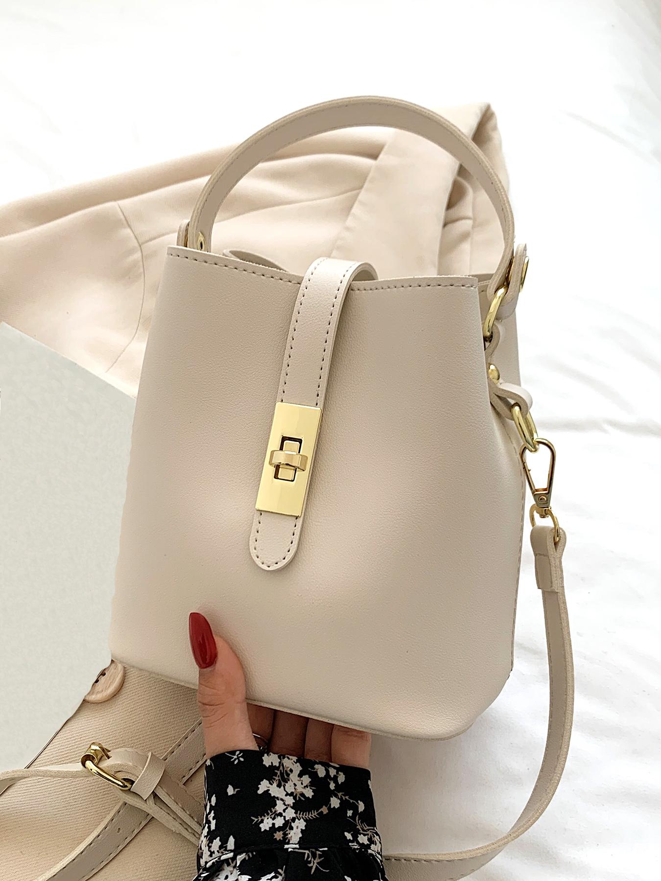 Niche design bucket crossbody bag, simple textured metal buckle decorated single shoulder crossbody handbag, fashionable and versatile daily commuting essential item, large capacity suitable for office workers, shopping, etc.