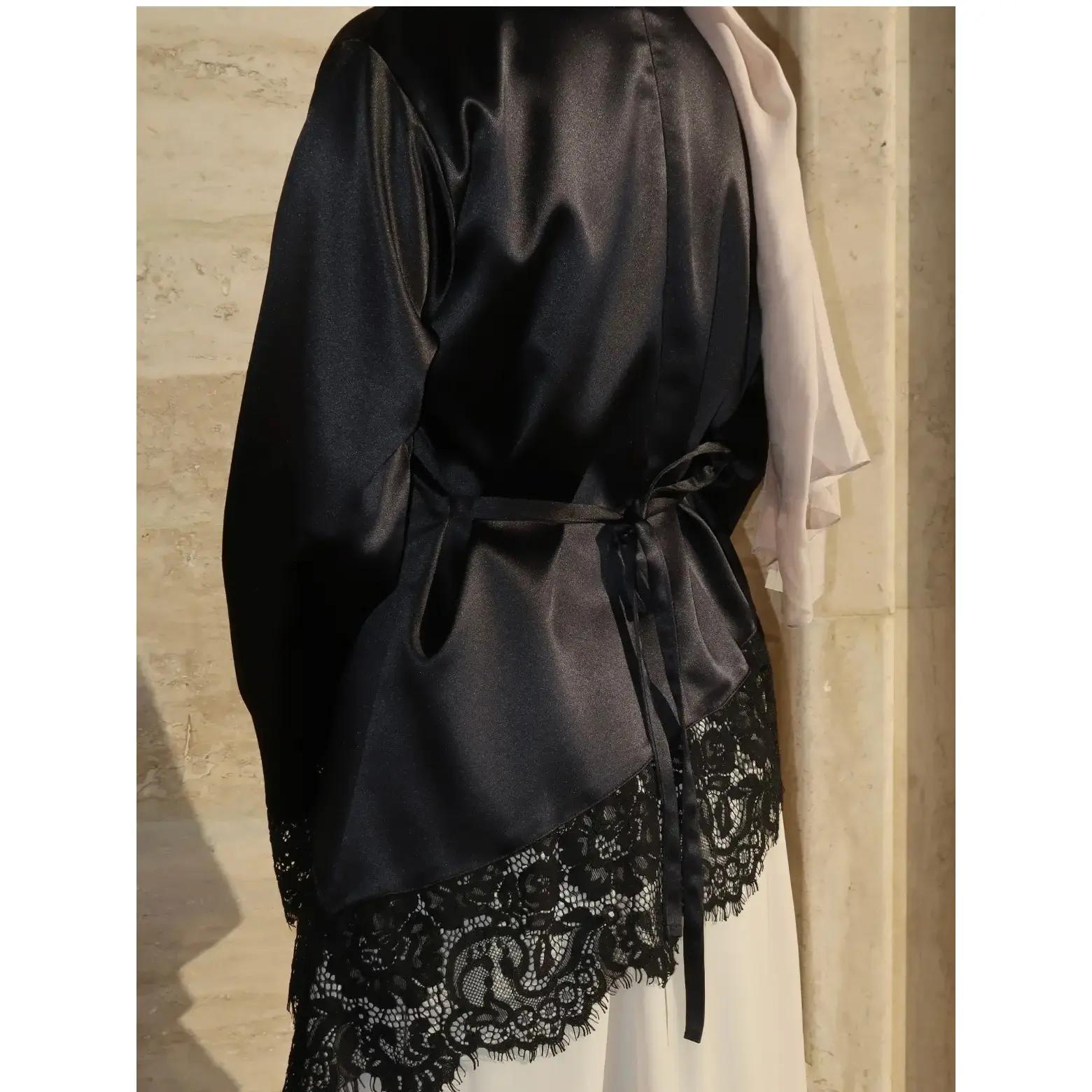 Lace trimmed satin lace up shirt