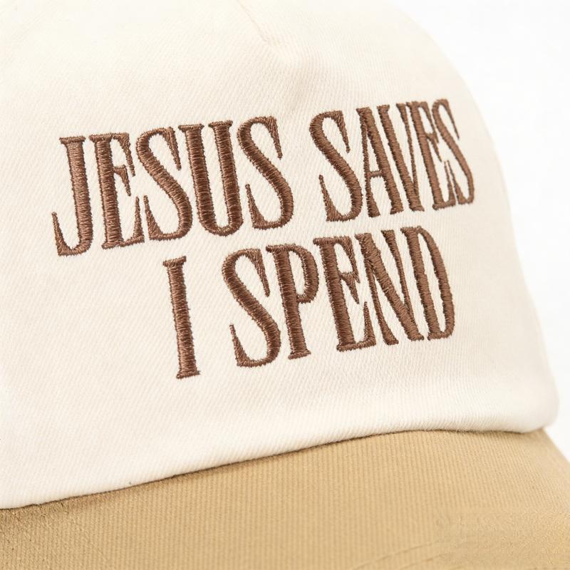 2026 trendy hat, featuring the embroidered "JESUS SAVES ISPEND" pattern, a baseball cap with a contrasting color design, adjustable and unisex unisex hat