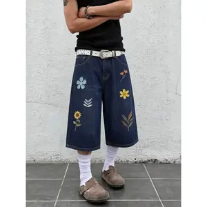 Men’s 3/4 loose denim shorts, Y2K hip-hop street style, floral appliqué patches, wide-leg denim shorts (jorts), vintage black wash, knee-length, casual skateboarding shorts, unisex denim apparel.