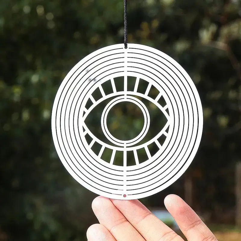 Turkish lucky eye amulet Nazar, a sun-catching device that reflects rotating wind chimes, a garden hanging decoration with aesthetic appeal