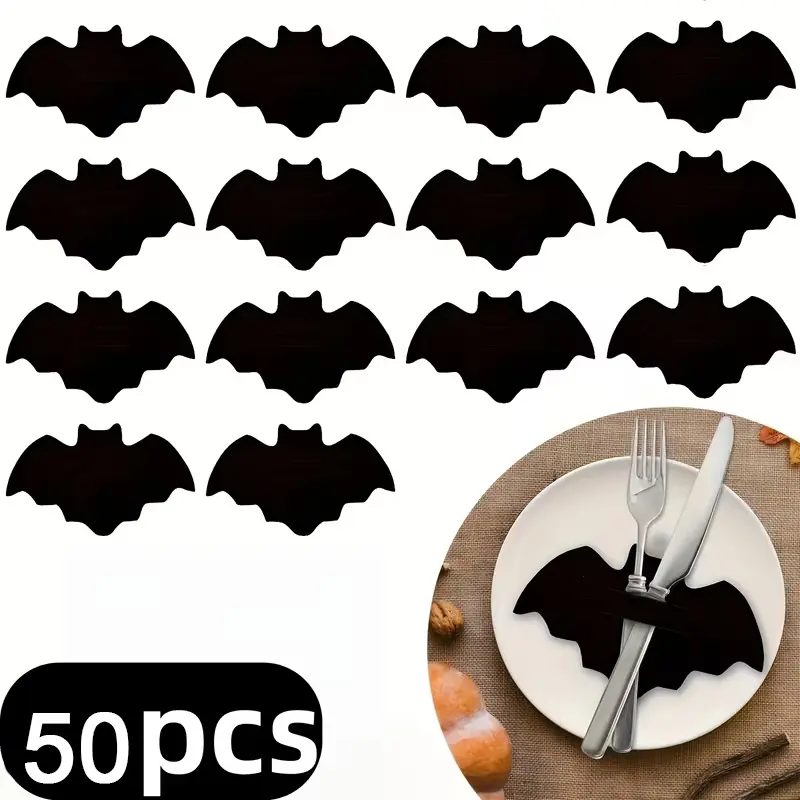 50 Pcs Bat-Shaped Knife, Fork, and Tongs, Halloween Bat-Shaped Heat-Resistant Placemats, Spooky Table Decor, Polyester Cutlery Sleeves. Candy Tongs, Placemats. Adds to the Festive Atmosphere, Halloween Decorations, Festive Tableware Arrangements.
