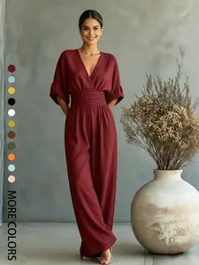 Summer new fashionable and high-end V-neck one-piece wide leg pants with cinched waist for slimming effect. Bubble sleeve design is suitable for daily travel, outdoor lawn banquets, light wedding outfits, afternoon tea, commuting