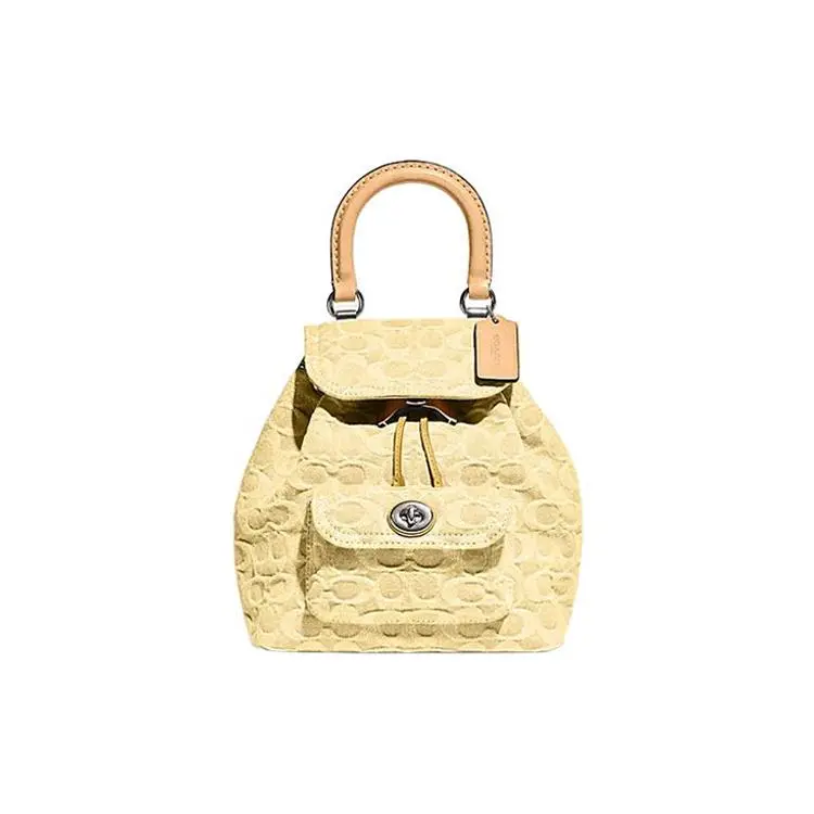 COACH Riya 21 Solid-Color Monogram Snap-Clasp Classic Canvas Backpack for Women in Yellow