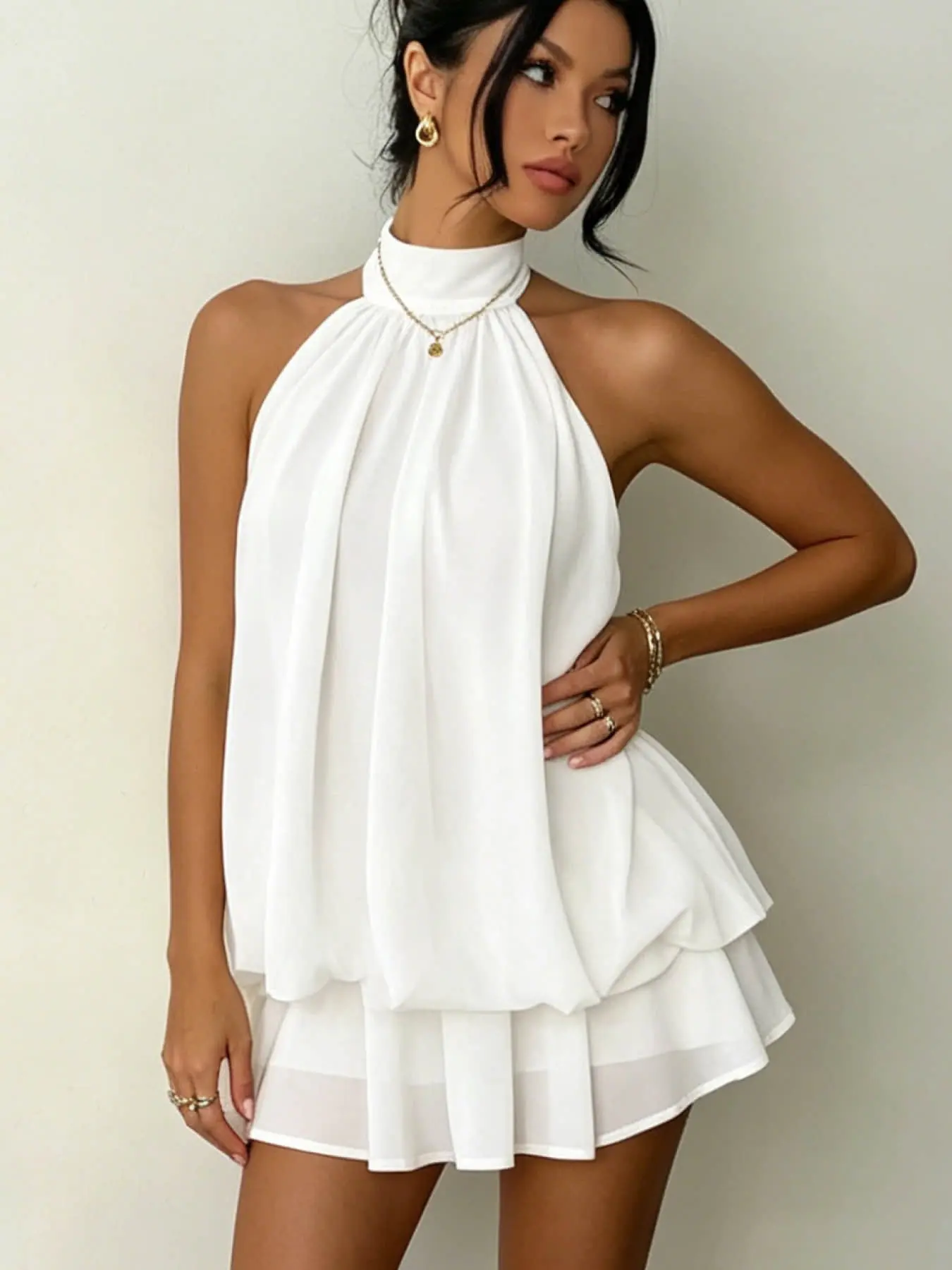 A fashionable and slim fitting sexy backless, sleeveless, neck tied, waist cinched, and fluffy dress for women, suitable for summer, vacation, shopping, photography, parties, and bars