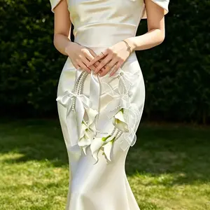 Artificial Calla Lily Garland Bouquet: A bridal handheld floral garland featuring pearl bead accents and satin ribbon bows—a lifelike faux floral arrangement ideal for weddings, bridesmaids, photography, and party decor.