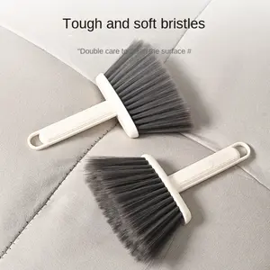 A multi-functional cleaning brush suitable for various household surfaces—including windowsills, crevices, and keyboards—featuring soft bristles that gently clean car interiors and other narrow spaces.