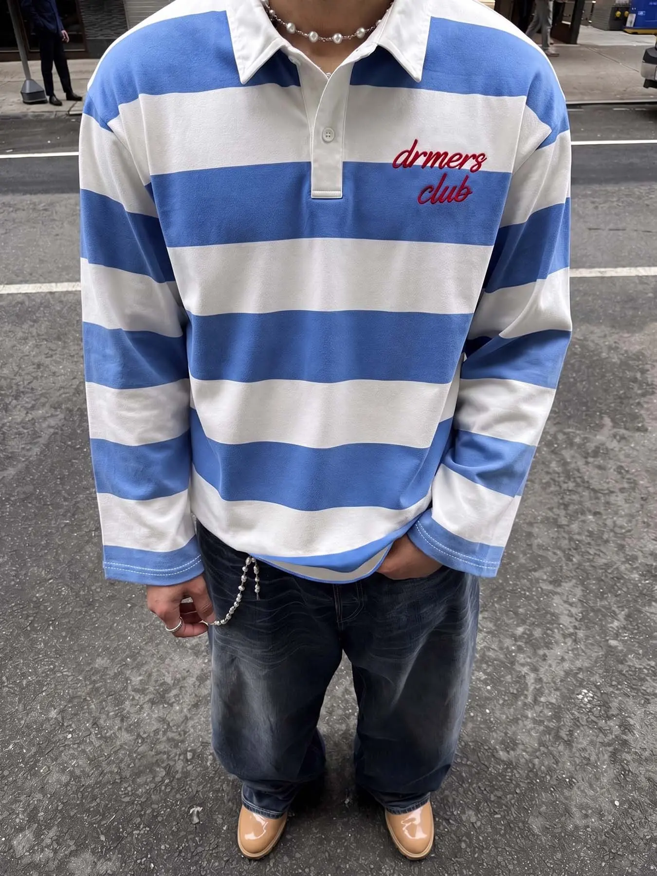 Blue and white striped long-sleeve polo with a collar, Dreamers Club red letter loose casual streetwear top, suitable for city strolls, campus gatherings, and everyday casual outfits #StripedPolo #CampusStreetStyle