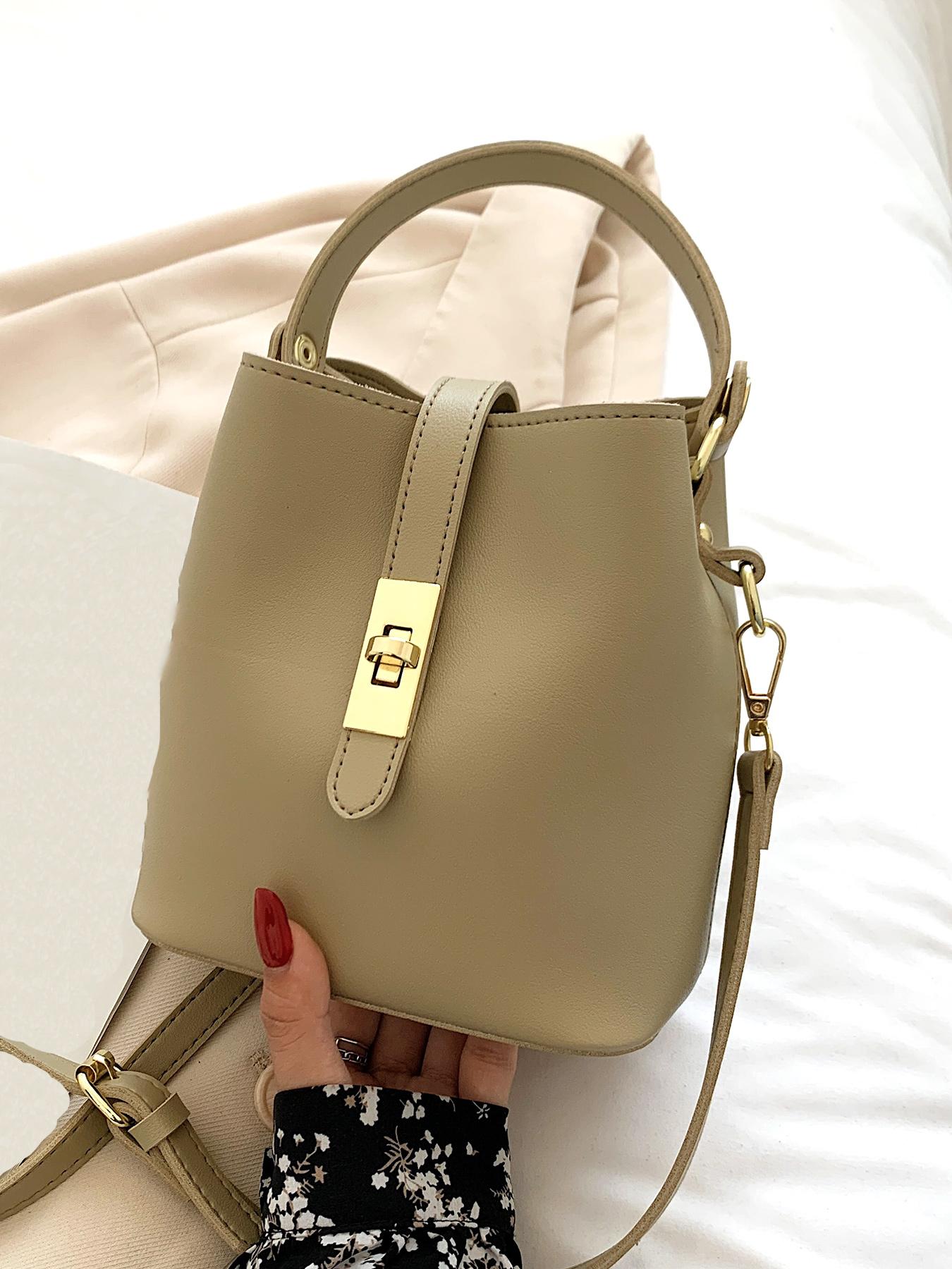 Niche design bucket crossbody bag, simple textured metal buckle decorated single shoulder crossbody handbag, fashionable and versatile daily commuting essential item, large capacity suitable for office workers, shopping, etc.