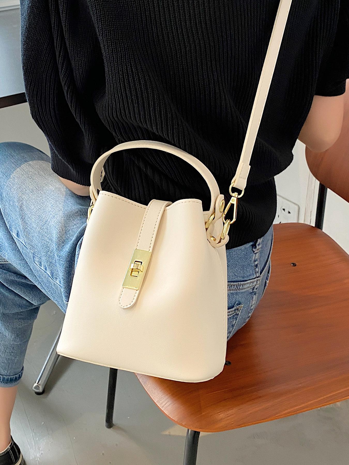 Niche design bucket crossbody bag, simple textured metal buckle decorated single shoulder crossbody handbag, fashionable and versatile daily commuting essential item, large capacity suitable for office workers, shopping, etc.