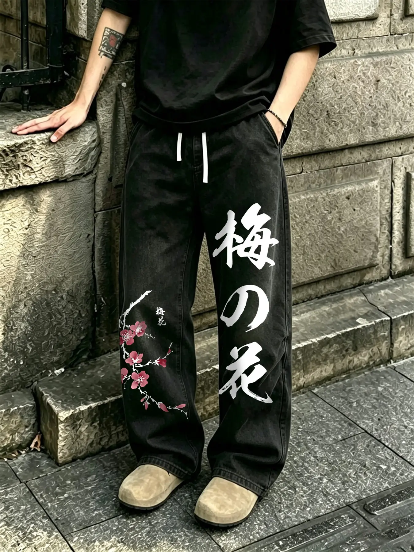 Men's sweatpants, washed and distressed finish, cotton fabric, plum blossom graphic, slightly flared fit, casual and lightweight, basic and versatile style.