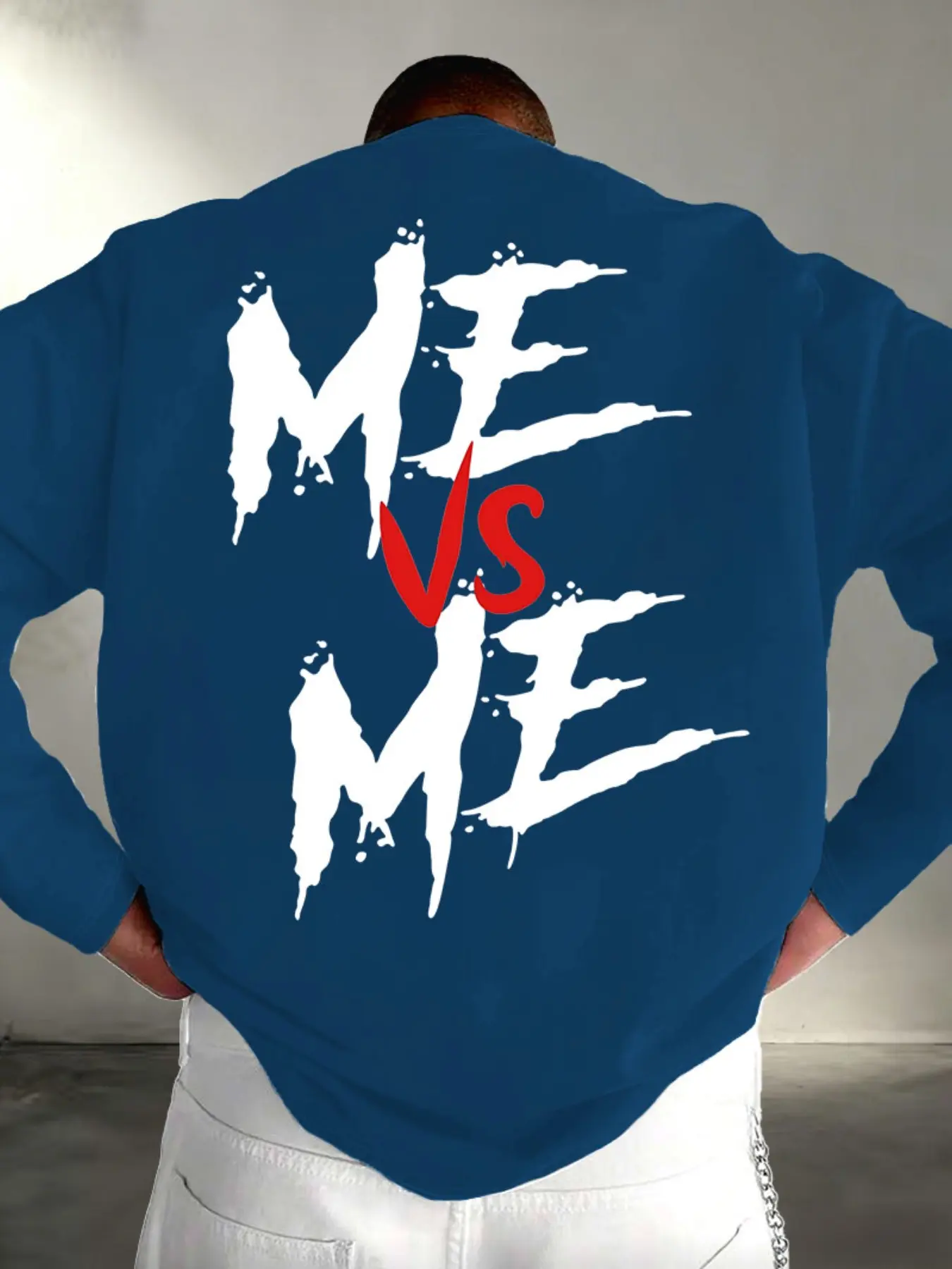 Men Crew Neck Loose Long Sleeve Sweatshirt, Front Mini ME VS ME Dripping Graffiti Print & Back Large Distressed Letter Graphic Soft Curved Hem Motivational Street Layering Top #GraffitiPrintSweatshirt #MotivationalStreetTop #OversizeLongSleeve
