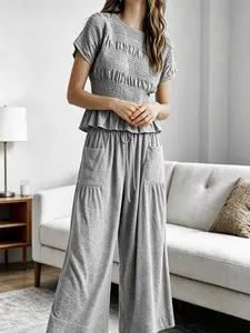 Women's Fashion High-End Textured Cotton Ruffled Short Sleeve Two-Piece Set, Casual, with waist-cinching ruffles and a flowing wide-leg pant design, perfect for summer, vacations, indoor, and outdoor wear