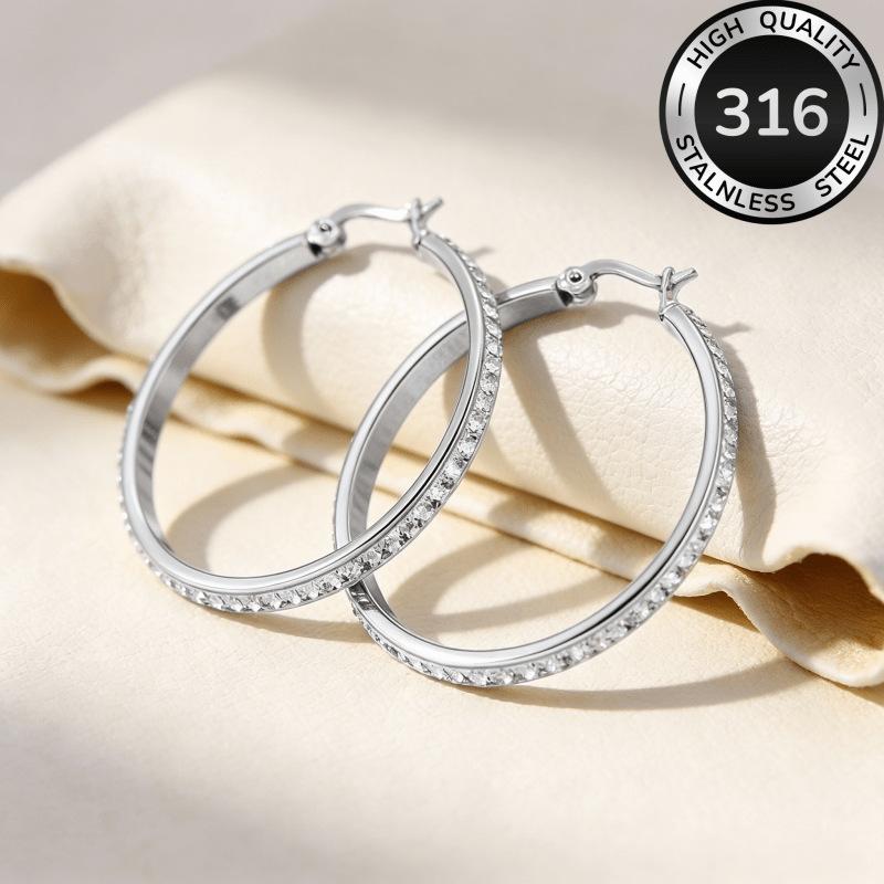 Round stainless steel diamond-encrusted earrings, a fashionable and light luxury accessory for women with large circular stud earrings