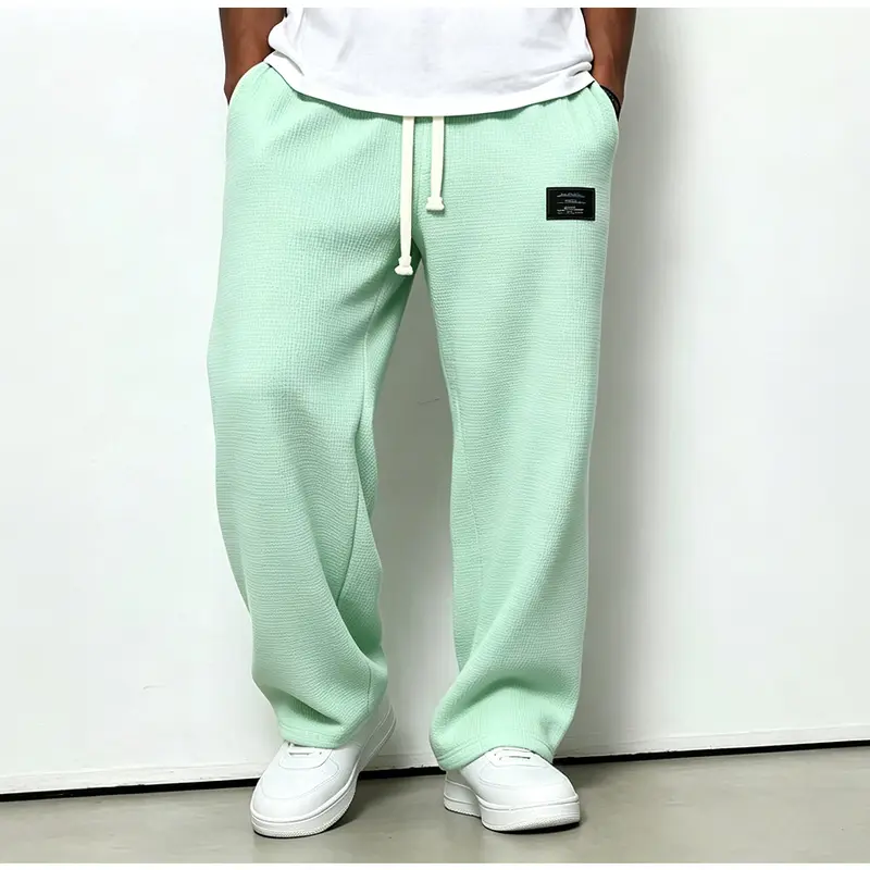 Men's Solid-Color Drawstring Pants with Curved Blade Design—Casual comfort, relaxed fit suitable for all seasons. Street-style men's trousers perfect for everyday wear and layering. Menswear Beige daily wear pant