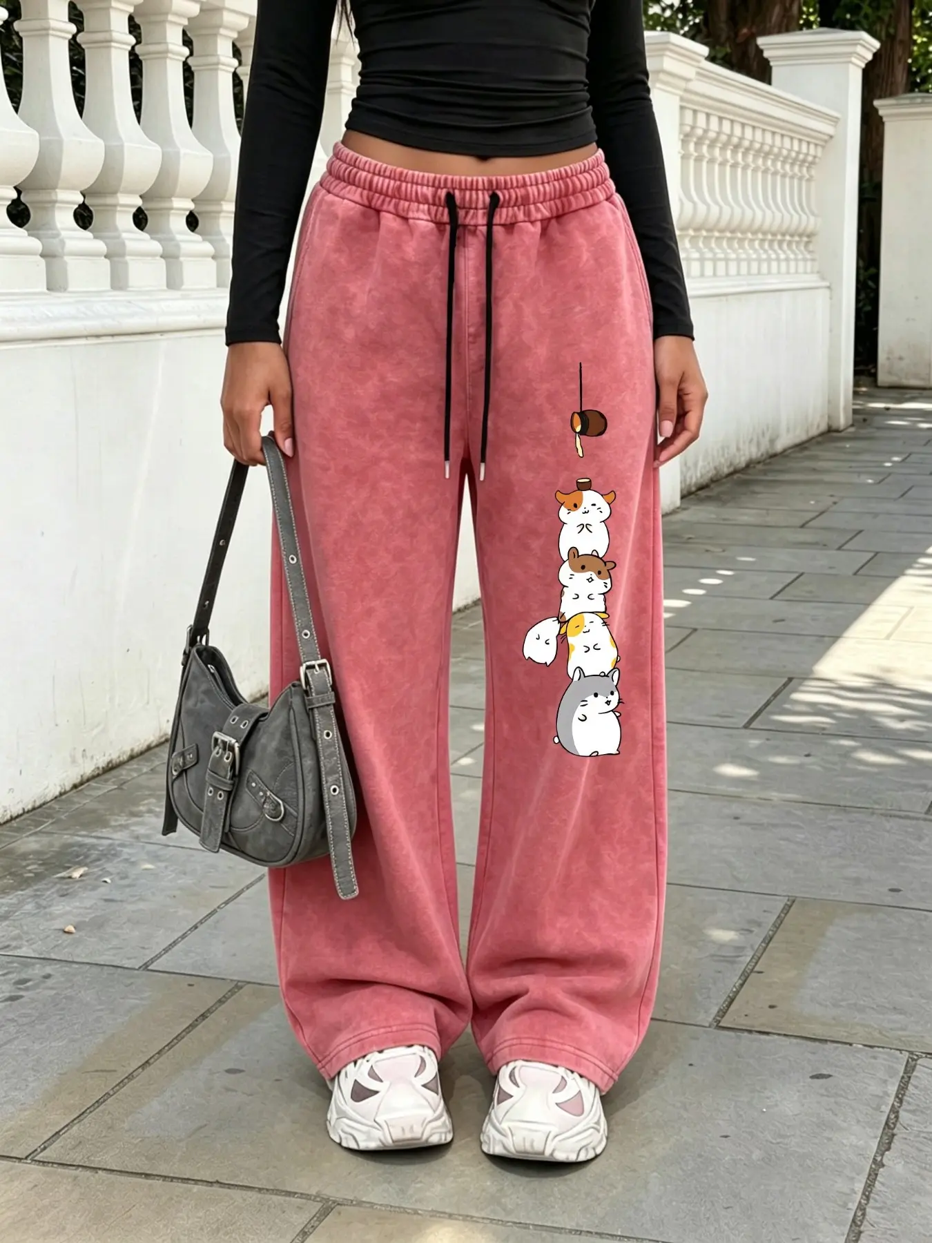 Retro-style stacked cartoon hamster print wide-leg sweatpants with a snowflake wash and fluid drape—a unique design perfect for commuting or versatile everyday styling.