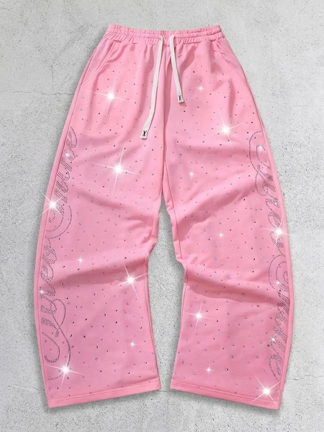 Pink rhinestone sweatpants, Y2K loose wide-leg trousers, suitable for unisex streetwear, trendy parties, and casual wear.