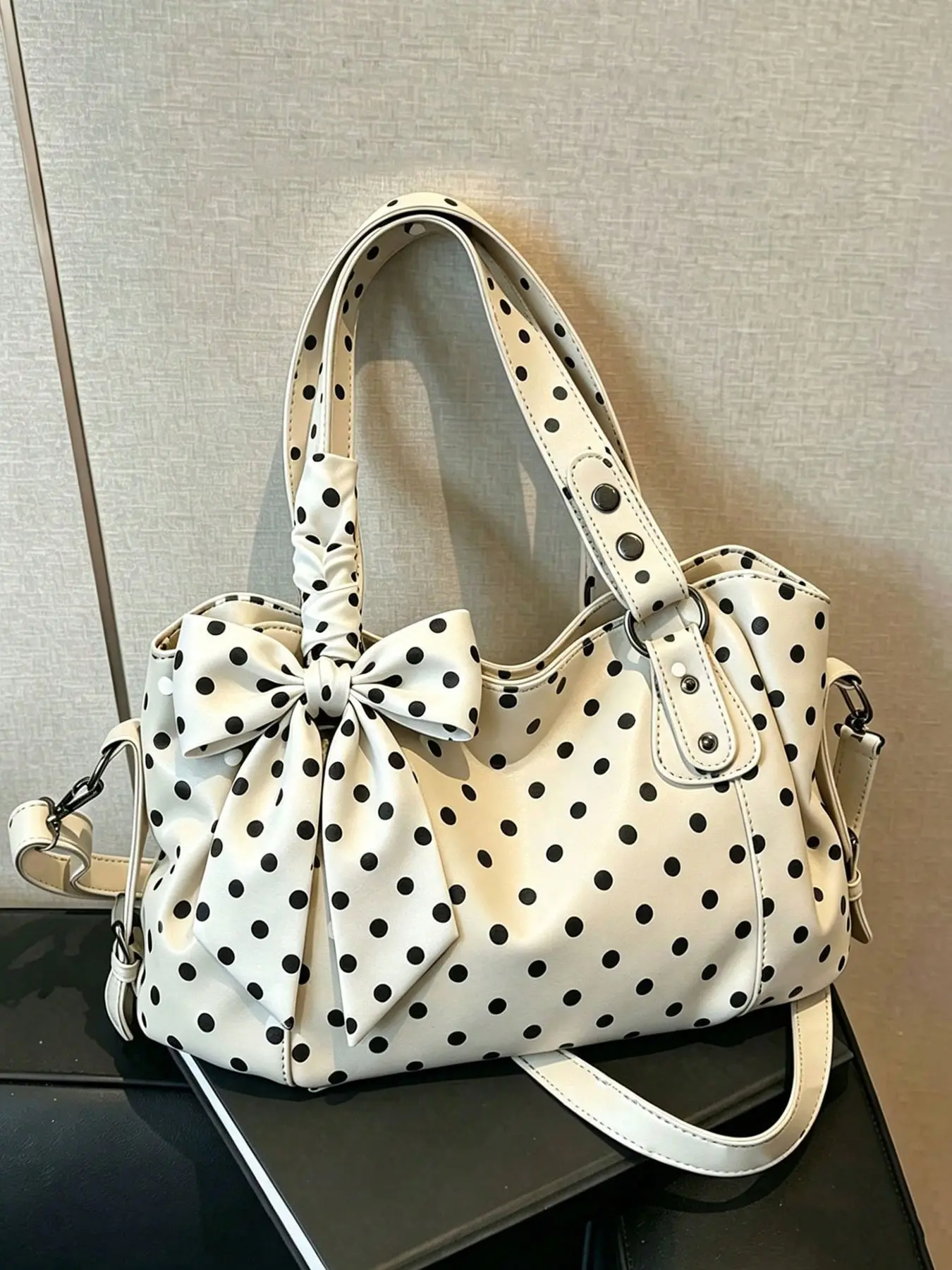 Extremely simple, high-end, fashionable and practical texture polka dot tote bag with polka dot bow pendant design, elegant and gentle style, large capacity personalized single shoulder handbag, can accommodate tablets, files, Exquisite tote bag