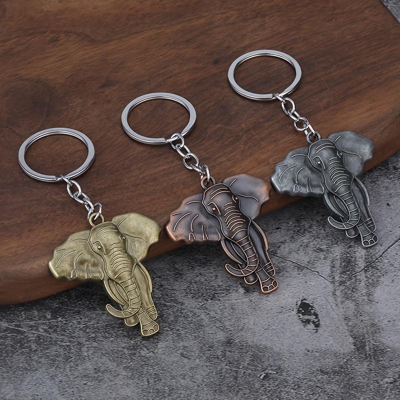 1. Vintage Zinc Alloy Elephant Keychain — Animal-Themed Key Ring. This keychain serves as a bag charm, travel souvenir, or gift.