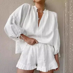 Fashion cotton and linen solid color loose V-neck lantern sleeve shorts two-piece set summer versatile sexy lace-up high waist set