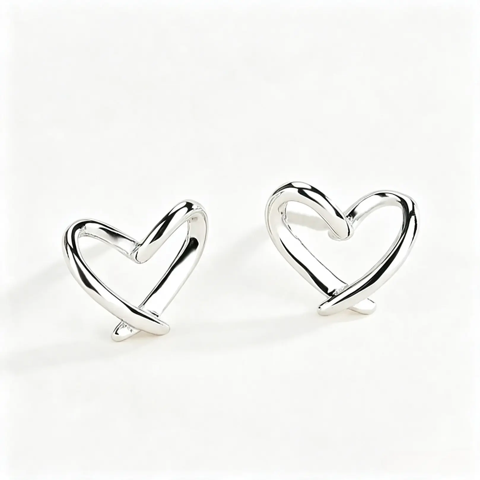 Simple Hollow Twisted Heart Stud Earrings, Minimalist Metal Jewelry For Women, Versatile All-match Ear Accessories, Ideal Decor For Daily Wear, Dating And Party Occasions, Lovely Gift Choice For Girls
