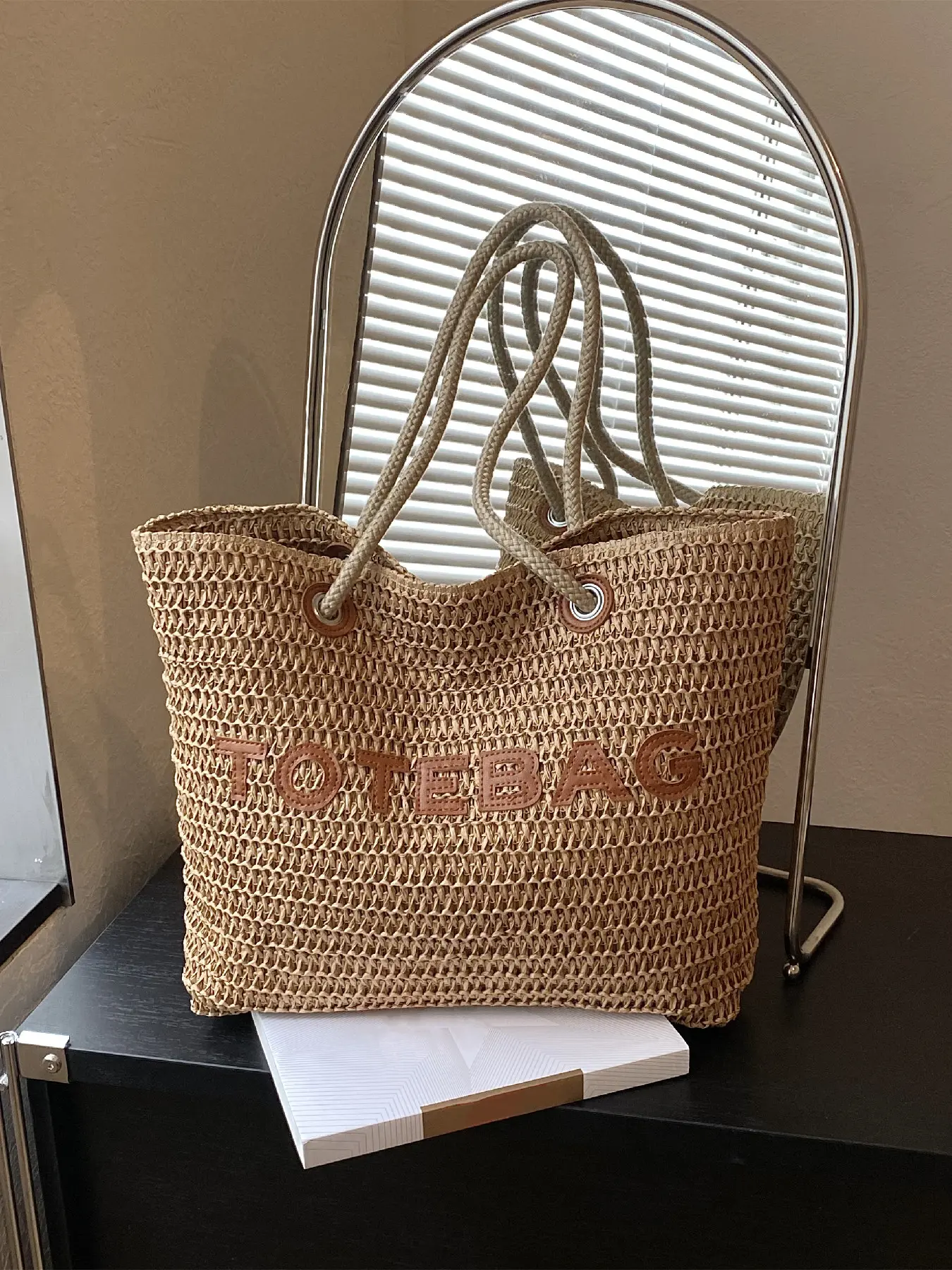 Simple and versatile large capacity letter decorated straw woven tote bag, trendy and fashionable, can be carried by hand, suitable for daily outings, dates, dinners, etc