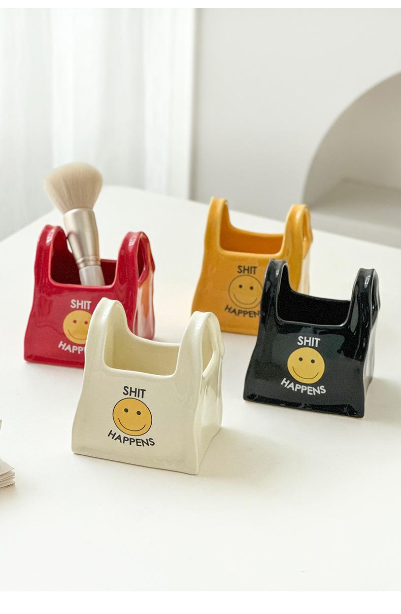Personalized handbag-style desktop creative ceramic pen holder, remote control and stationery storage box, makeup pen storage bucket, small decorative item Personalized handbag-style desktop creative ceramic pen holder, remote control and stationery storage box, makeup pen storage bucket, small decorative item