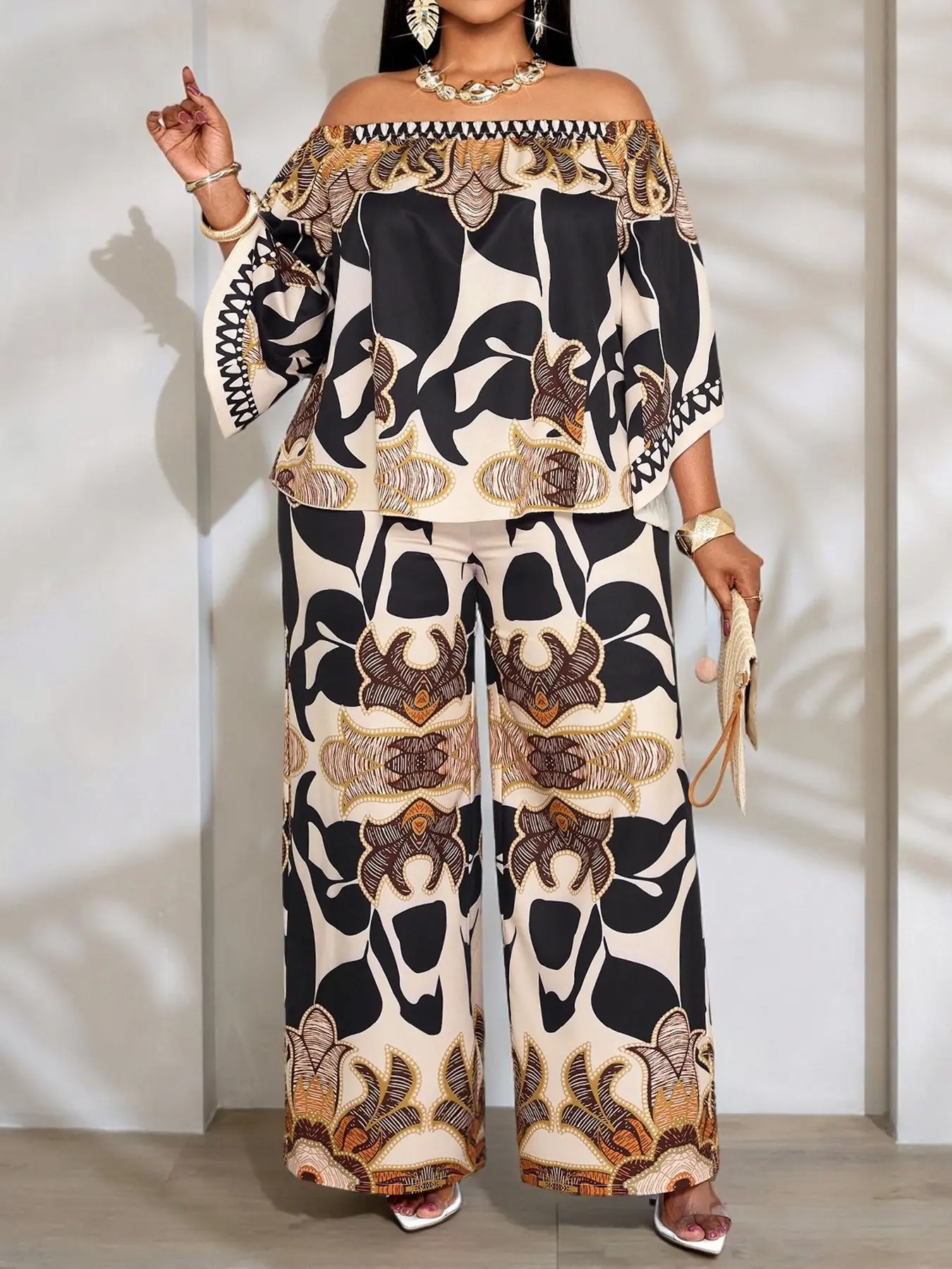 Summer Casual Fashion Plus-Size Women's Printed Pant Set: Two-Piece Outfit featuring an Off-Shoulder Batwing-Sleeve Top and High-Waisted Wide-Leg Trousers — Stylish Plus-Size Summer Apparel