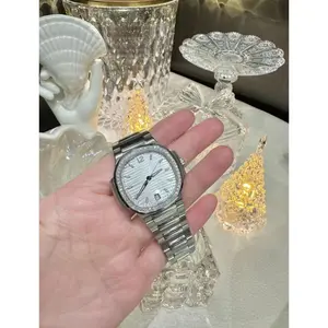 Featured here is the stunning  for women. Designed with a shimmering Mother of Pearl dial and a brilliant diamond bezel, it’s the perfect balance of "Quiet Luxury" and timeless power. Whether for the office or a gala, this piece elevates every look