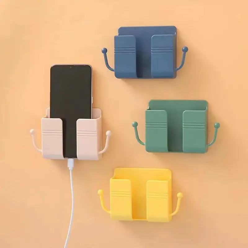 Mobile phone holder mounted on self-adhesive wall, wall-mounted mobile phone holder with hook and cable clip, wall-mounted mobile phone holder with charging plug and wall regulator, remote control suitable for kitchen and living room, (random colors)