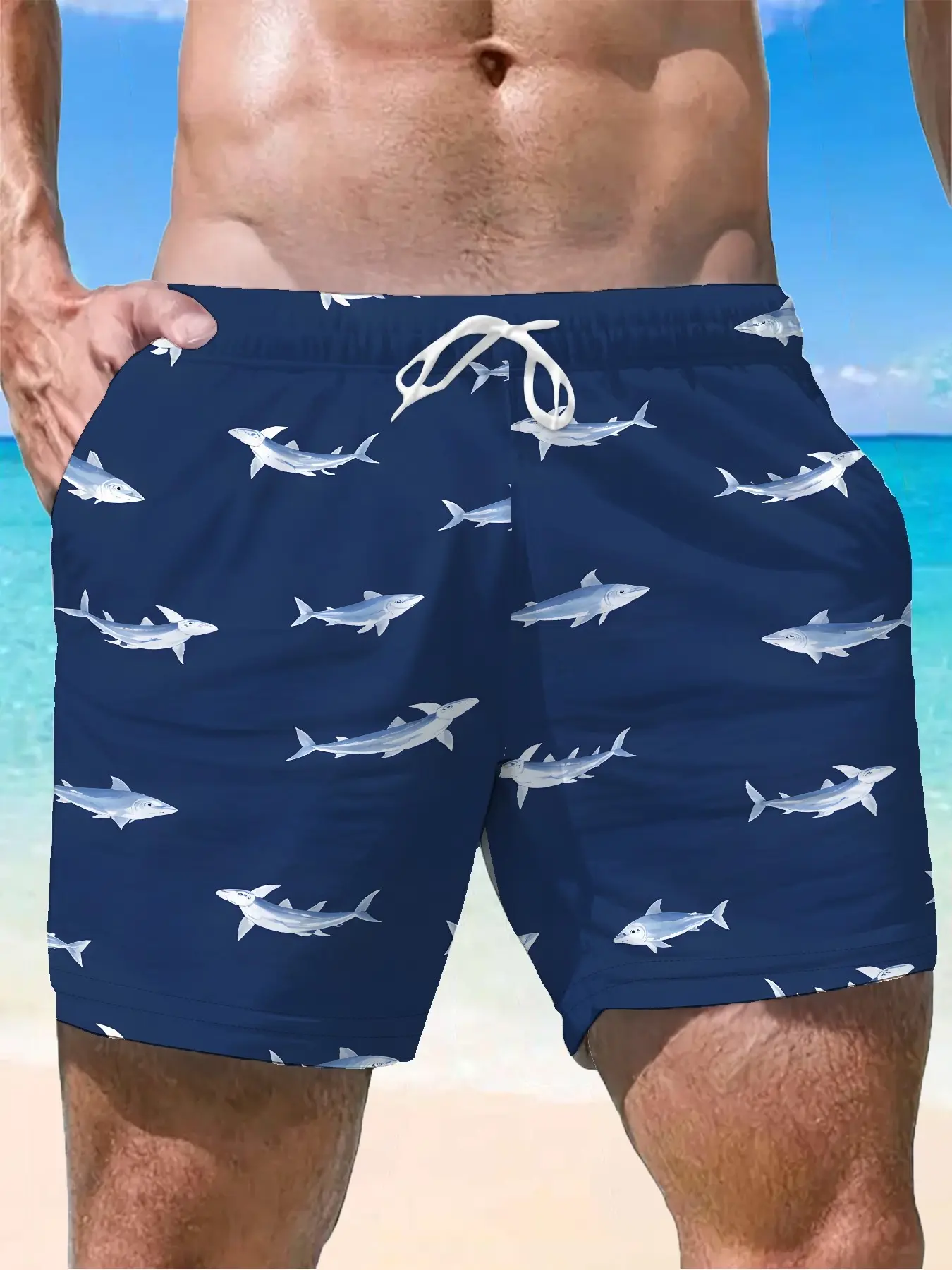 Men Sleek Marine Board Shorts, Deep Navy Base With Neat Scattered Light-toned Swimming Shark Illustrations, White Drawstring Waist, Minimalist Ocean-themed Beach Shorts