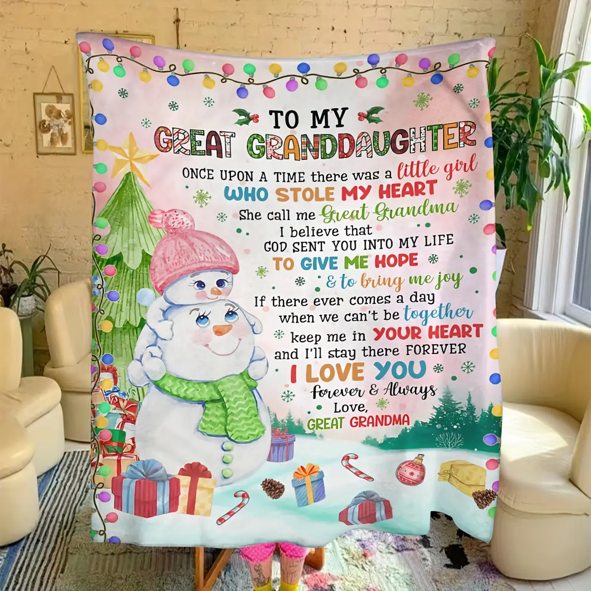 A high-quality, cozy flannel blanket with a snowman design, gifted by grandmother to her granddaughter for Christmas.