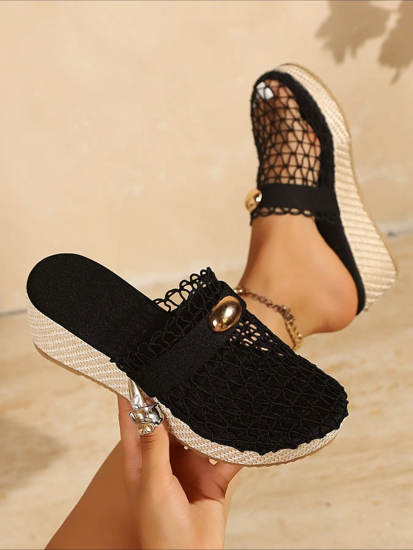 Mesh hollow mules with metal ornament, woven wedge platform, breathable slip-on shoes, elegant summer footwear for holiday and daily wear.