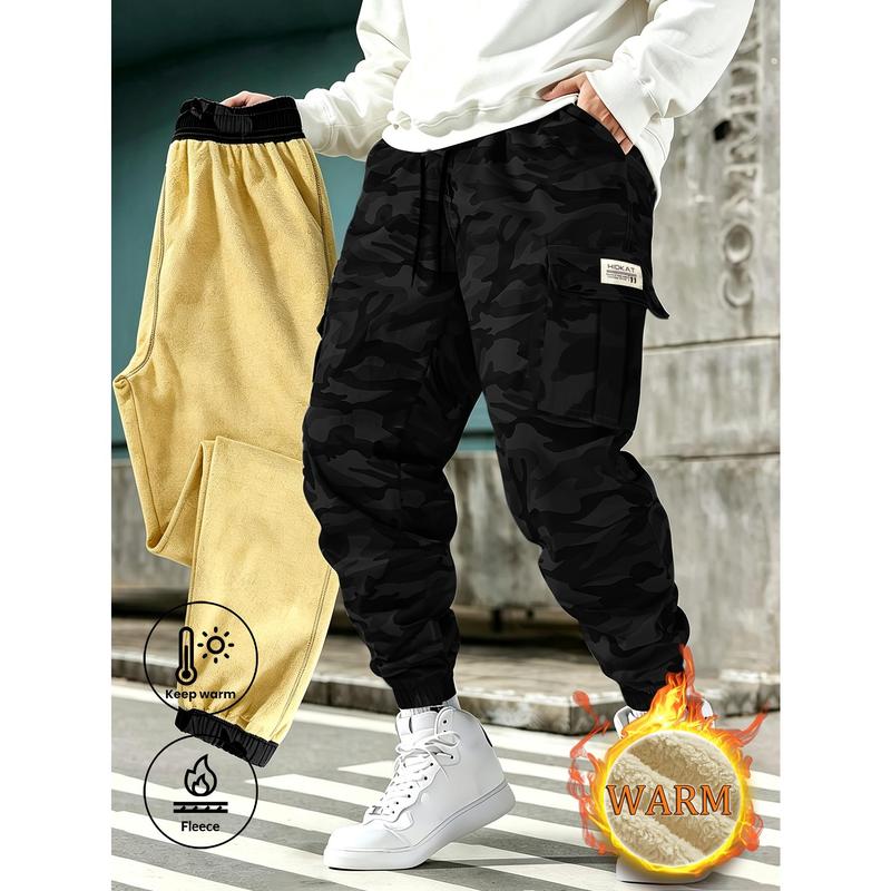 Men's fleece lined camo cargo joggers, soft and warm street style winter pants with multi functional pockets, tapered fit, great for lounging at home or heading out