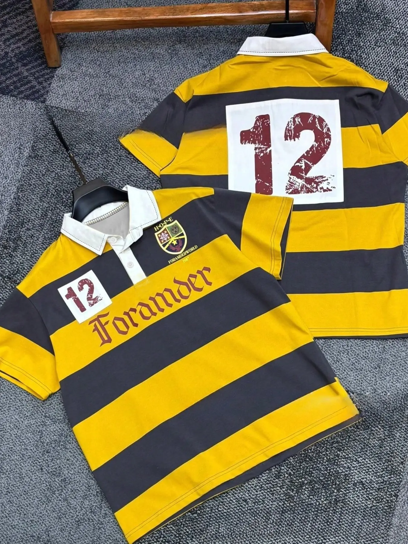 Men's Short-Sleeve Rugby Polo Shirt Featuring a Vintage-Style Striped Design, a Badge, and a "12" Print; a Loose-Fitting Collared Top Perfect for Everyday Millennial Streetwear Style.