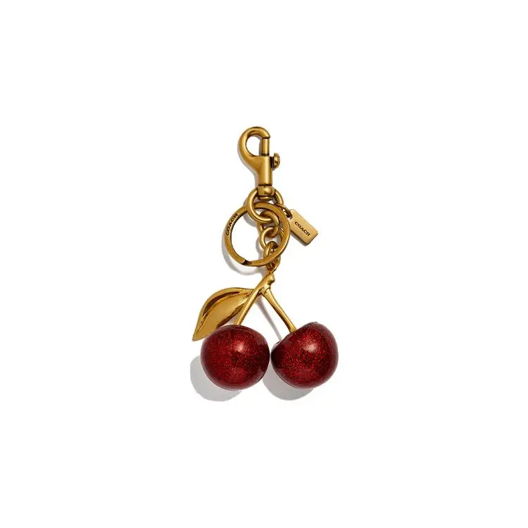 Coach Cherry Bag Charm for Women – Resin and Metal Handbag Accessory in Red and Gold
