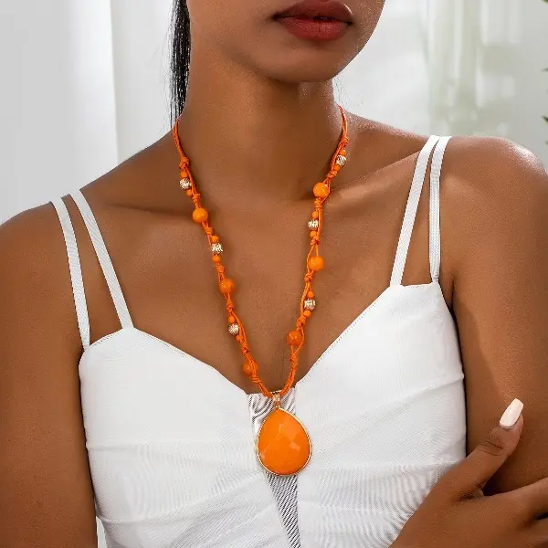 One, women's fashion pendant, long necklace, sweater chain, orange water drop-shaped handmade cord woven beads, retro bohemian style, suitable for daily gift giving