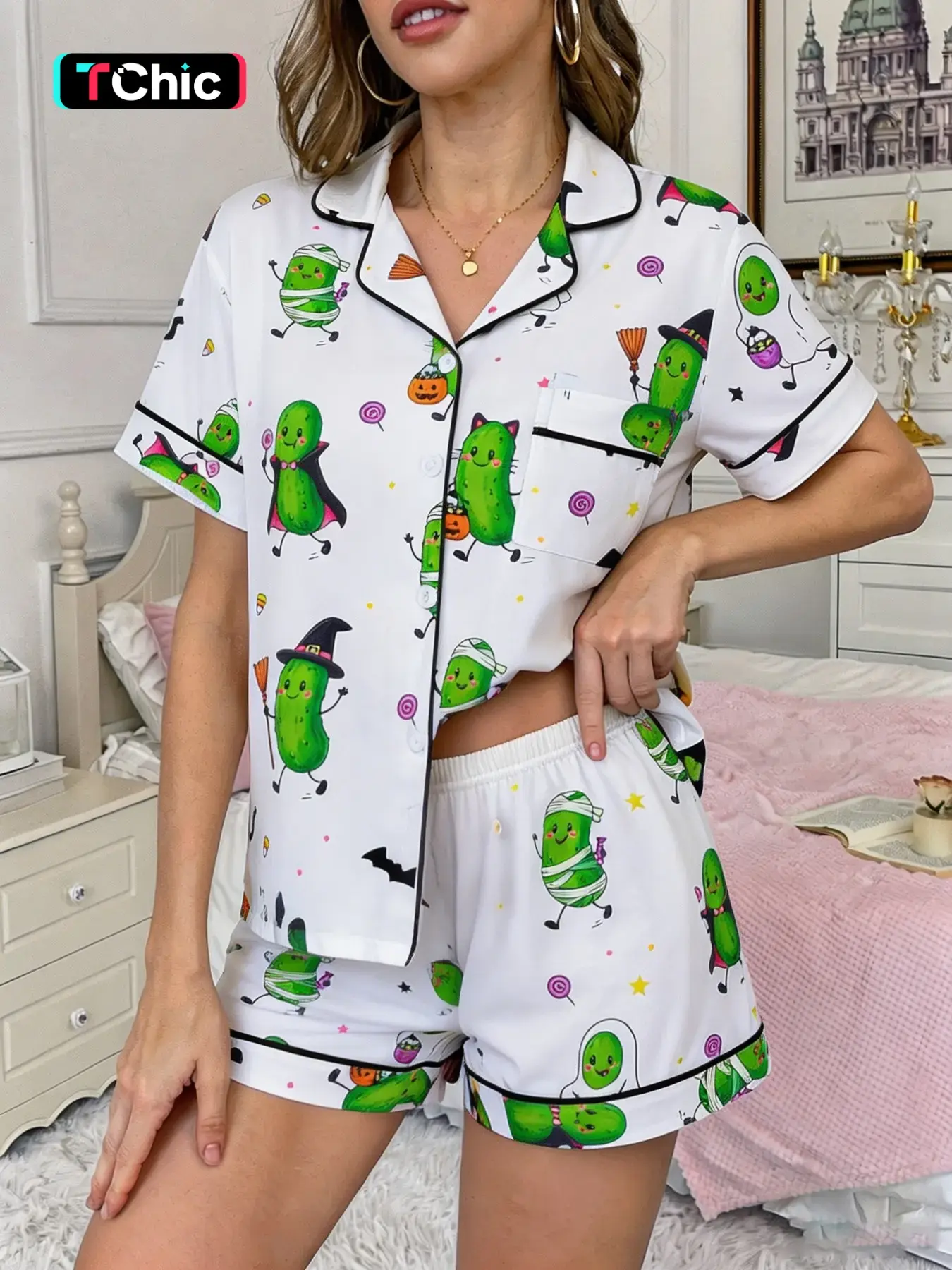Halloween 2-piece set for women, white background, full body cartoon Halloween outfit, cucumber lollipop, star pattern printed short sleeved shorts, soft and comfortable lapel design, small pocket top, elastic waistband, home daily women's sleepwear set